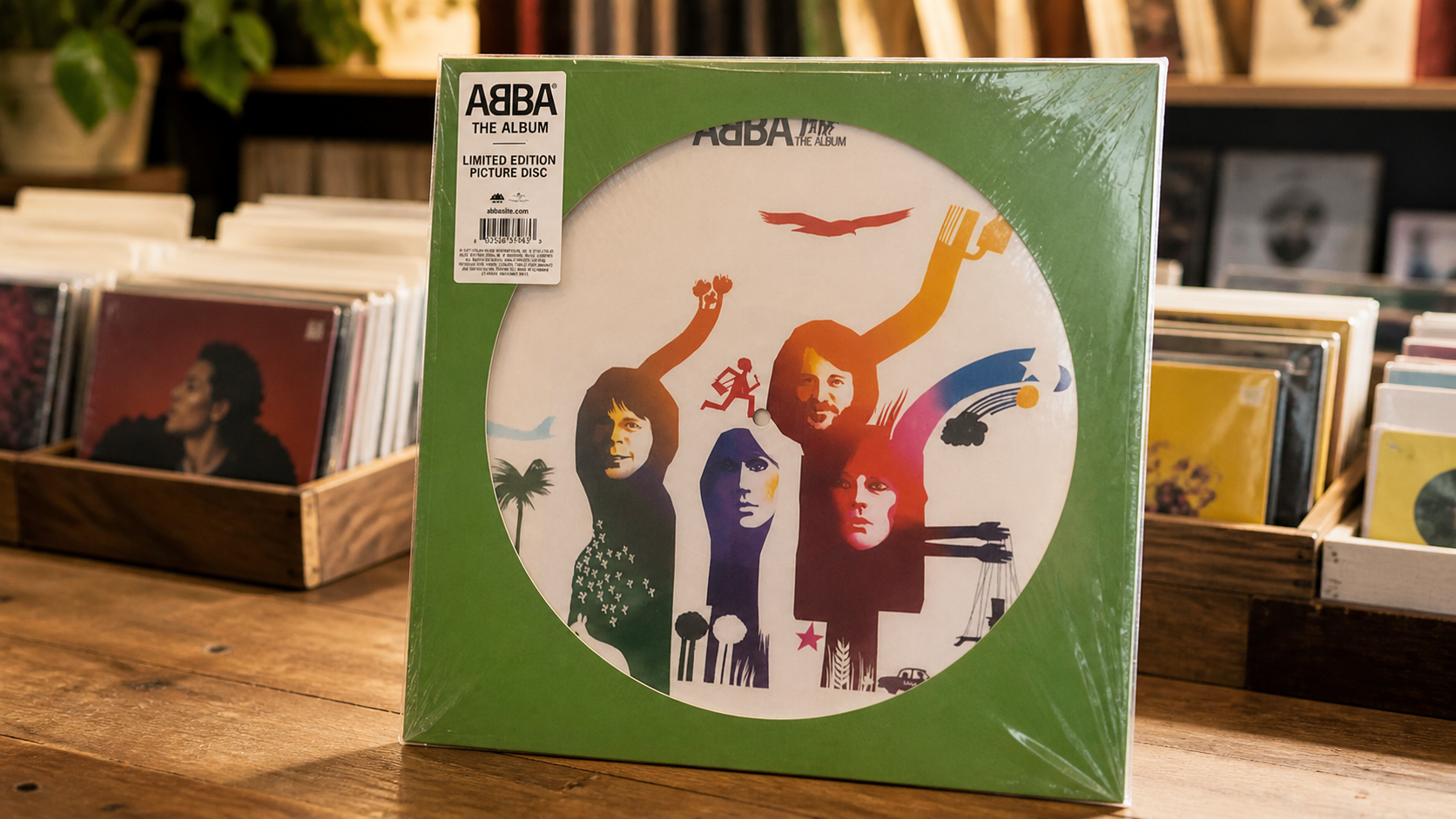 ABBA The Album limited edition picture disc sleeve standing on a warm record shop counter.