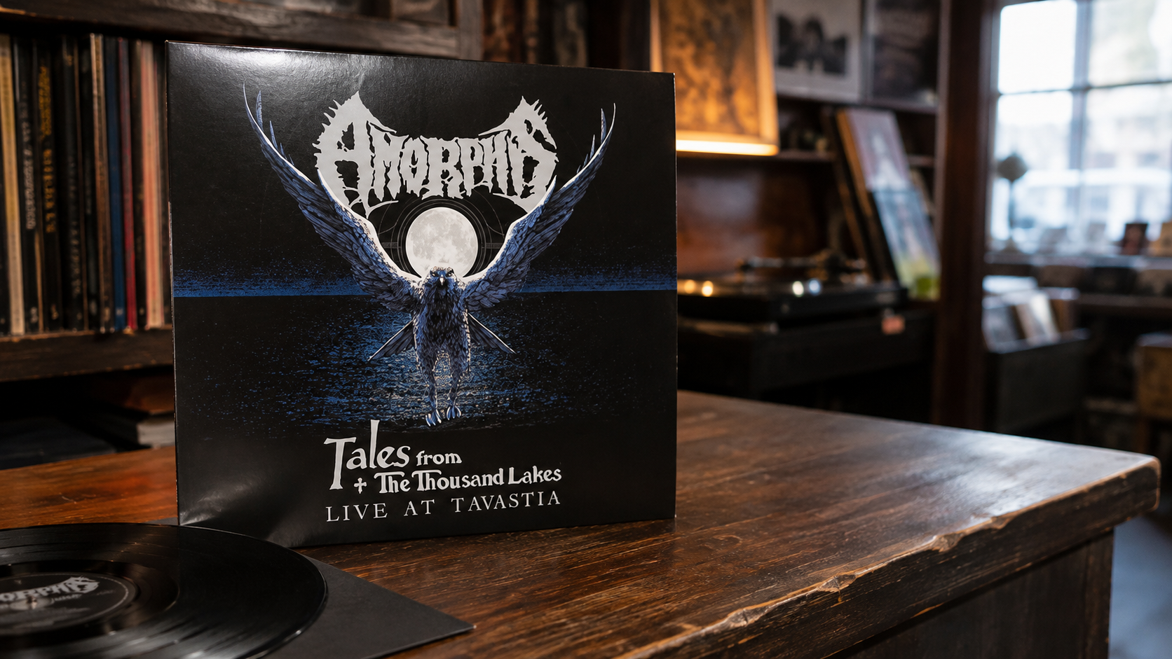Amorphis Tales from the Thousand Lakes Live at Tavastia vinyl 2LP sleeve standing on a warm record shop counter