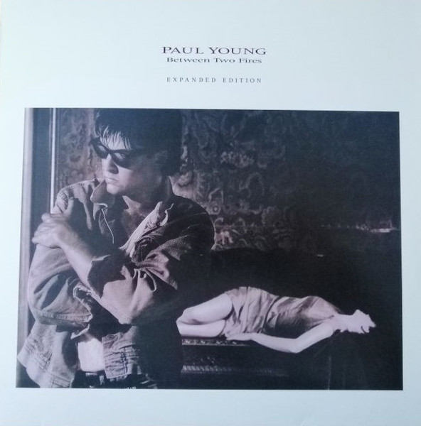 Paul Young - Between Two Fires album cover