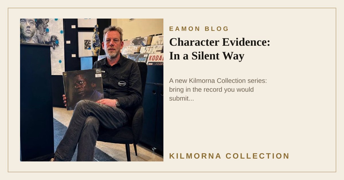 Eamon Lane seated inside The Kilmorna Collection holding Miles Davis In a Silent Way