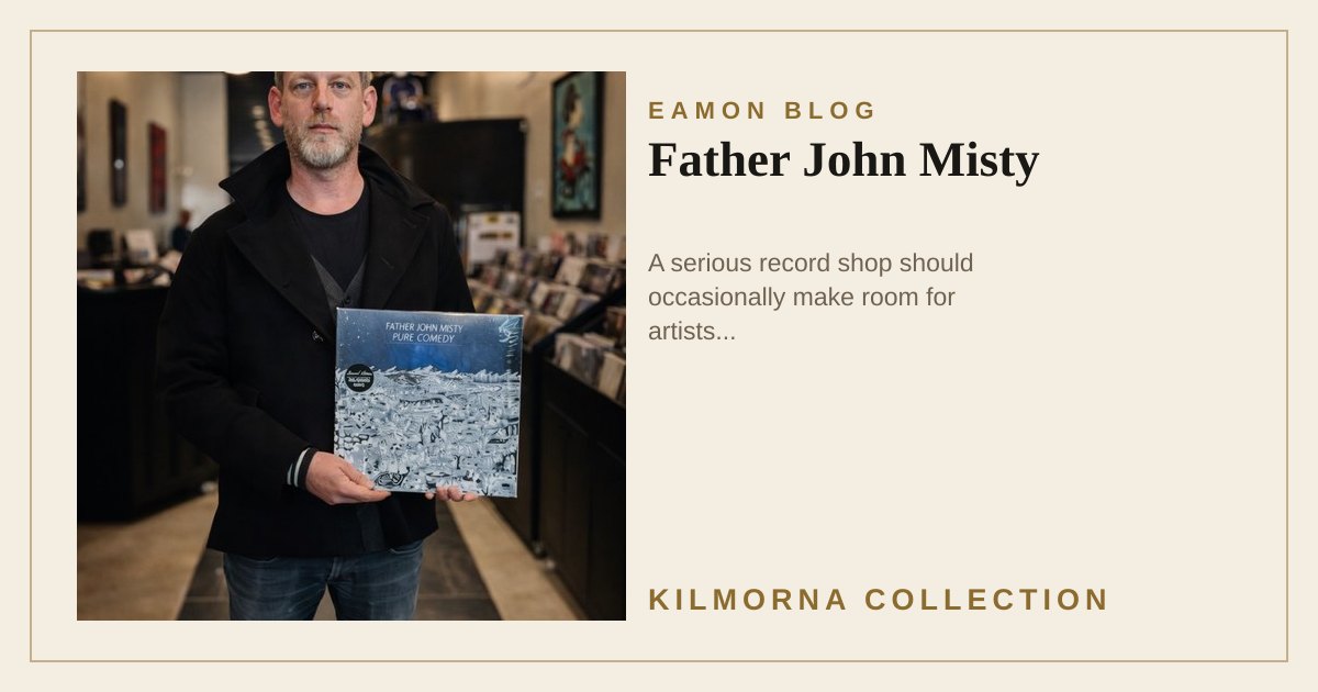 Eamon Lane holding Father John Misty Pure Comedy inside The Kilmorna Collection