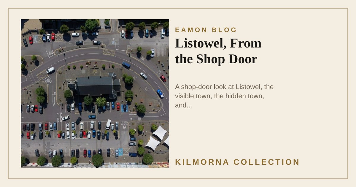 Aerial view of Listowel Square with the central market house, parked cars and surrounding streets