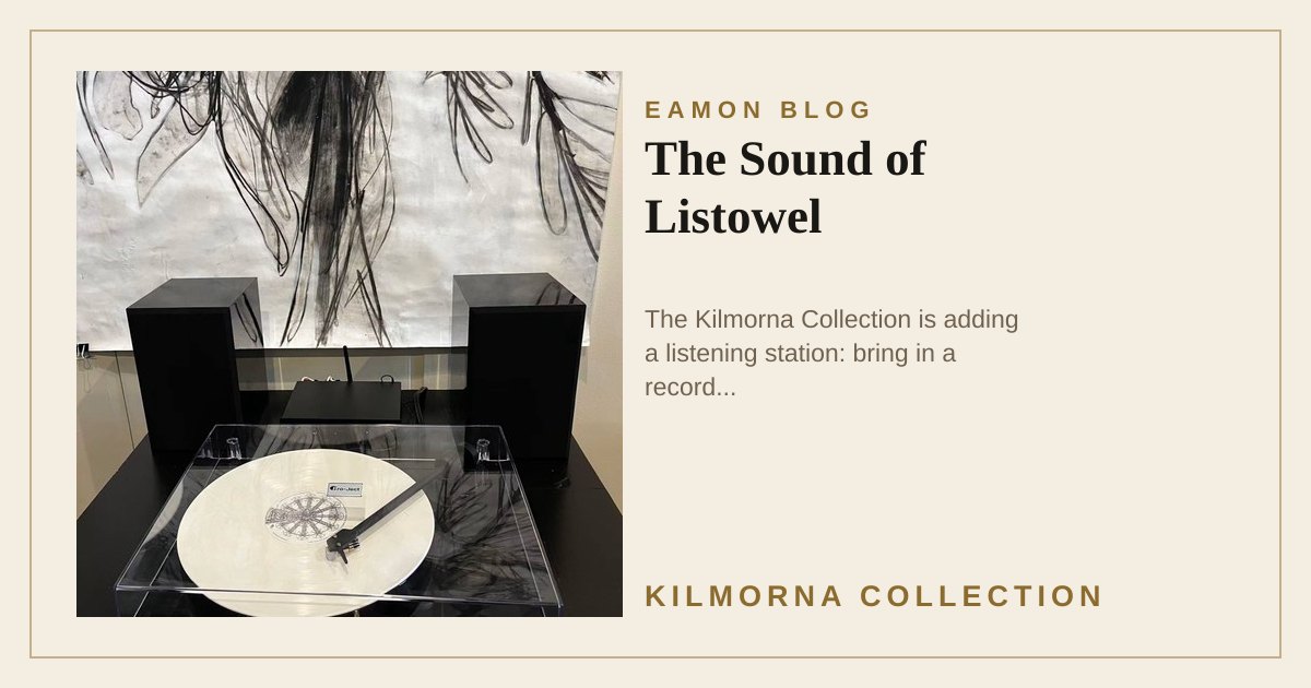 A Pro-Ject turntable with a white record, amplifier and speakers set up inside The Kilmorna Collection