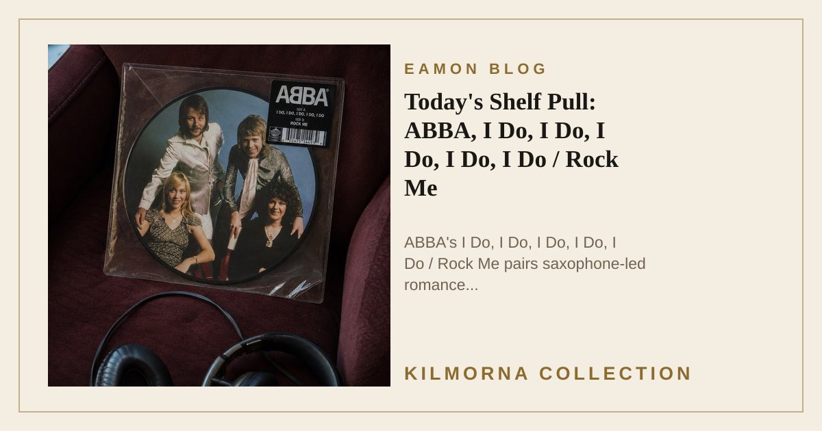 ABBA I Do, I Do, I Do, I Do, I Do / Rock Me vinyl picture disc in its clear sleeve on a walnut stand beside a saxophone