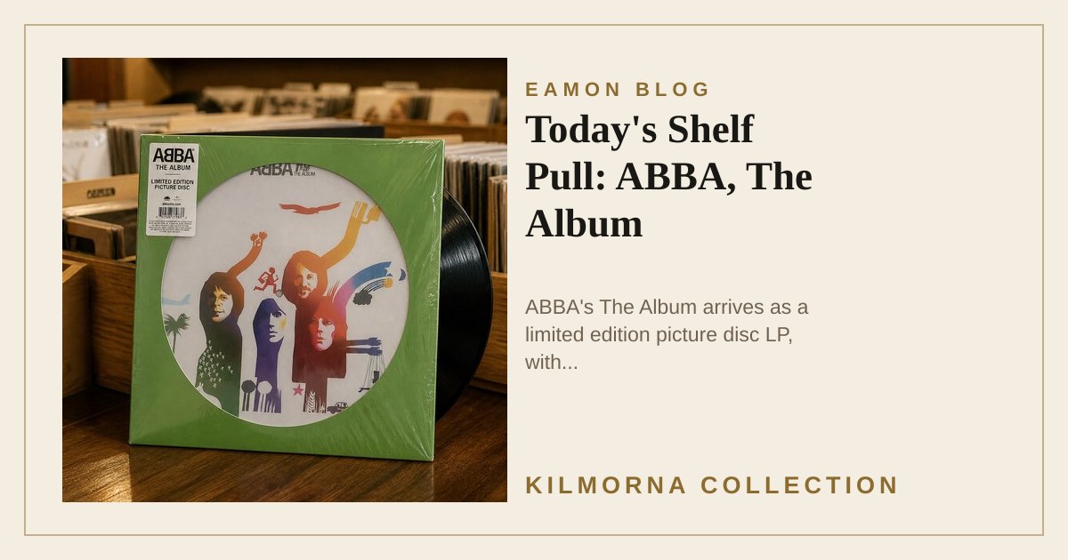 ABBA The Album limited edition picture disc sleeve standing on a warm record shop counter.