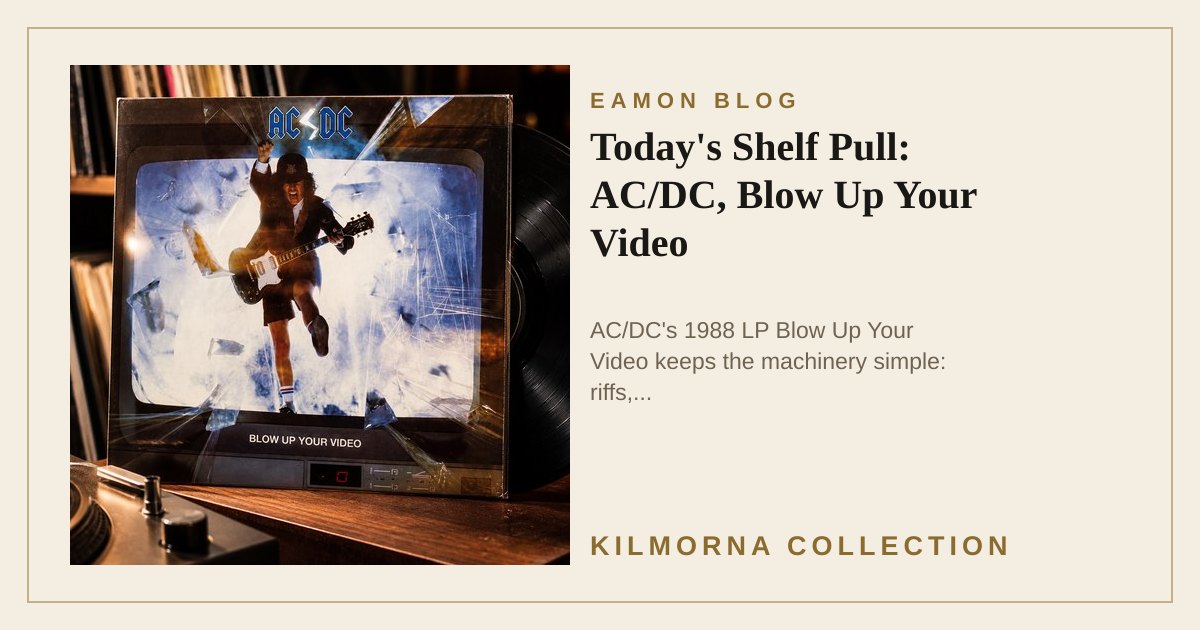 AC/DC Blow Up Your Video vinyl sleeve propped on a warm record shop counter