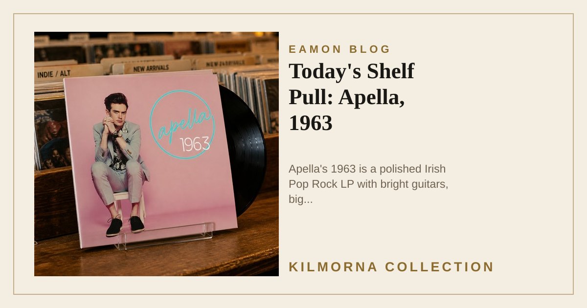 Apella 1963 vinyl sleeve standing on a warm record shop counter with a black record behind it.